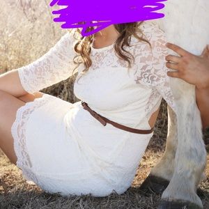 White lace dress with back cut out.